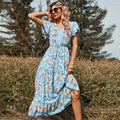 2022 Europe and the United States spring and summer new Lotus leaf short-sleeve V-neck strap pink printed mid-length women's dress wholesale