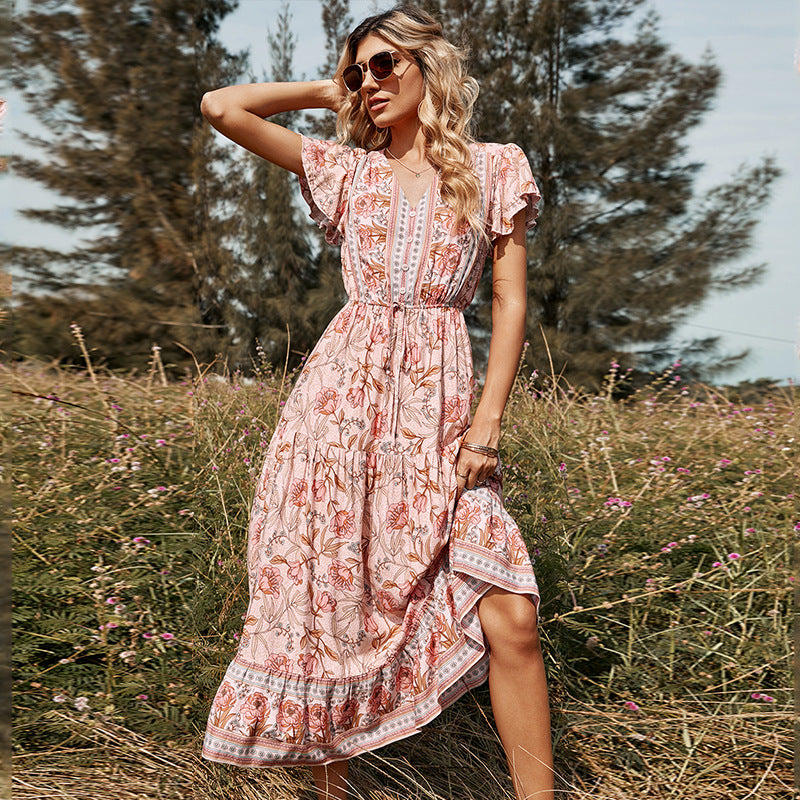2022 Europe and the United States spring and summer new Lotus leaf short-sleeve V-neck strap pink printed mid-length women's dress wholesale